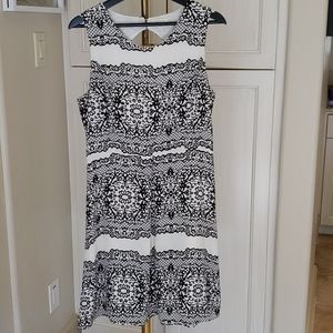 Black and Cream dress with printed lace design.
